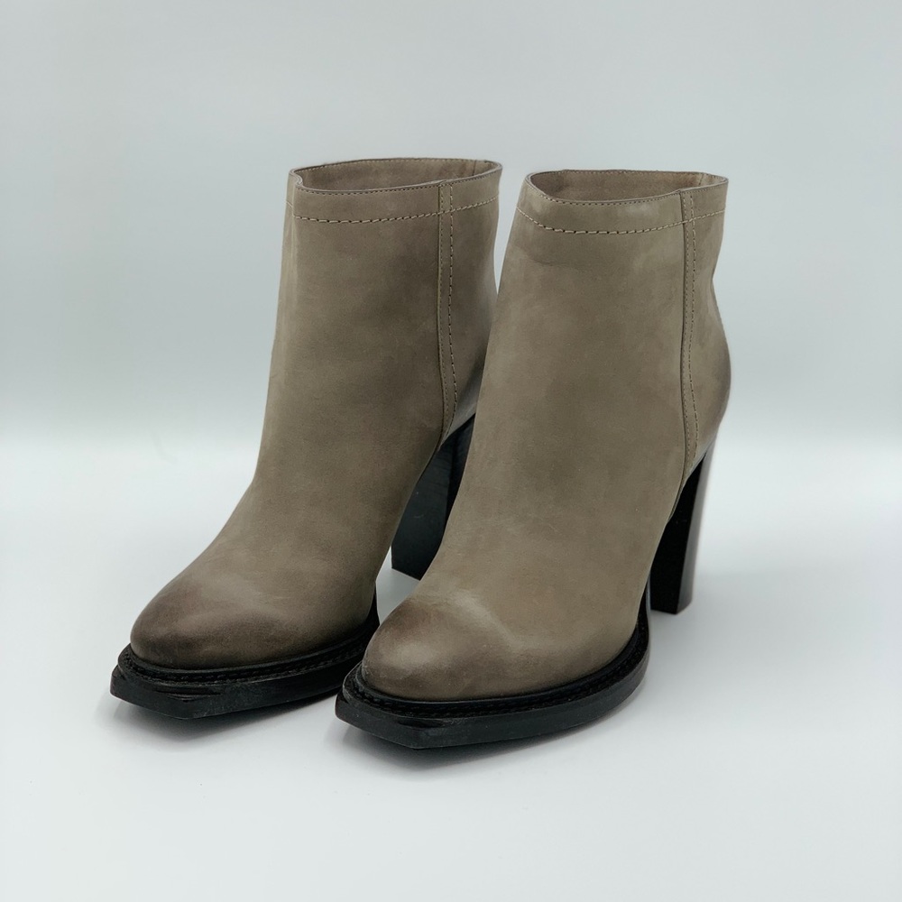 Shearling-lined distressed leather ankle boots
